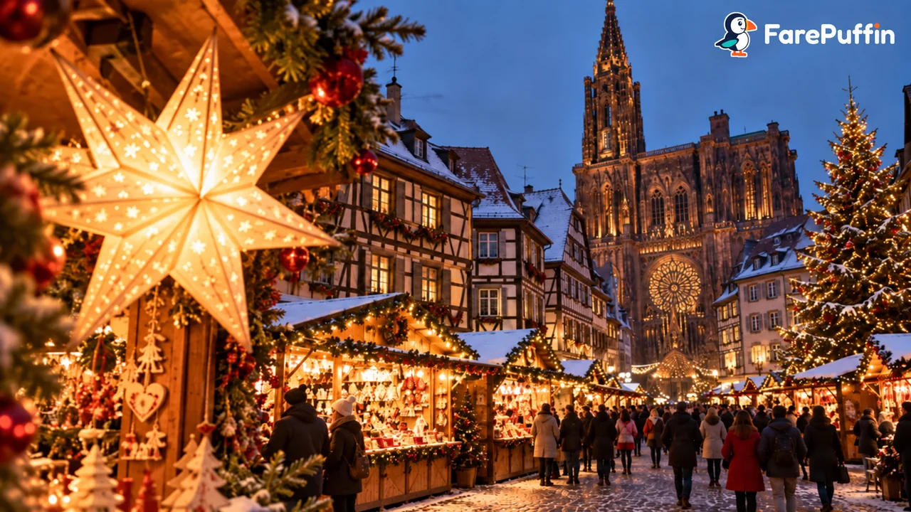 Glowing lantern and stalls at a European Christmas market